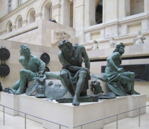 three statues in the Louvre