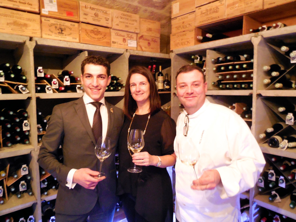 Alex Morin, Priscilla Pilon, Chef Frion in the wine cellar
