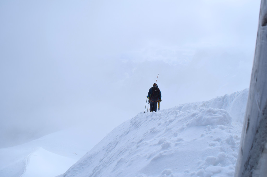 Last in a group of hikers about to descend from the Aiguille du Midi