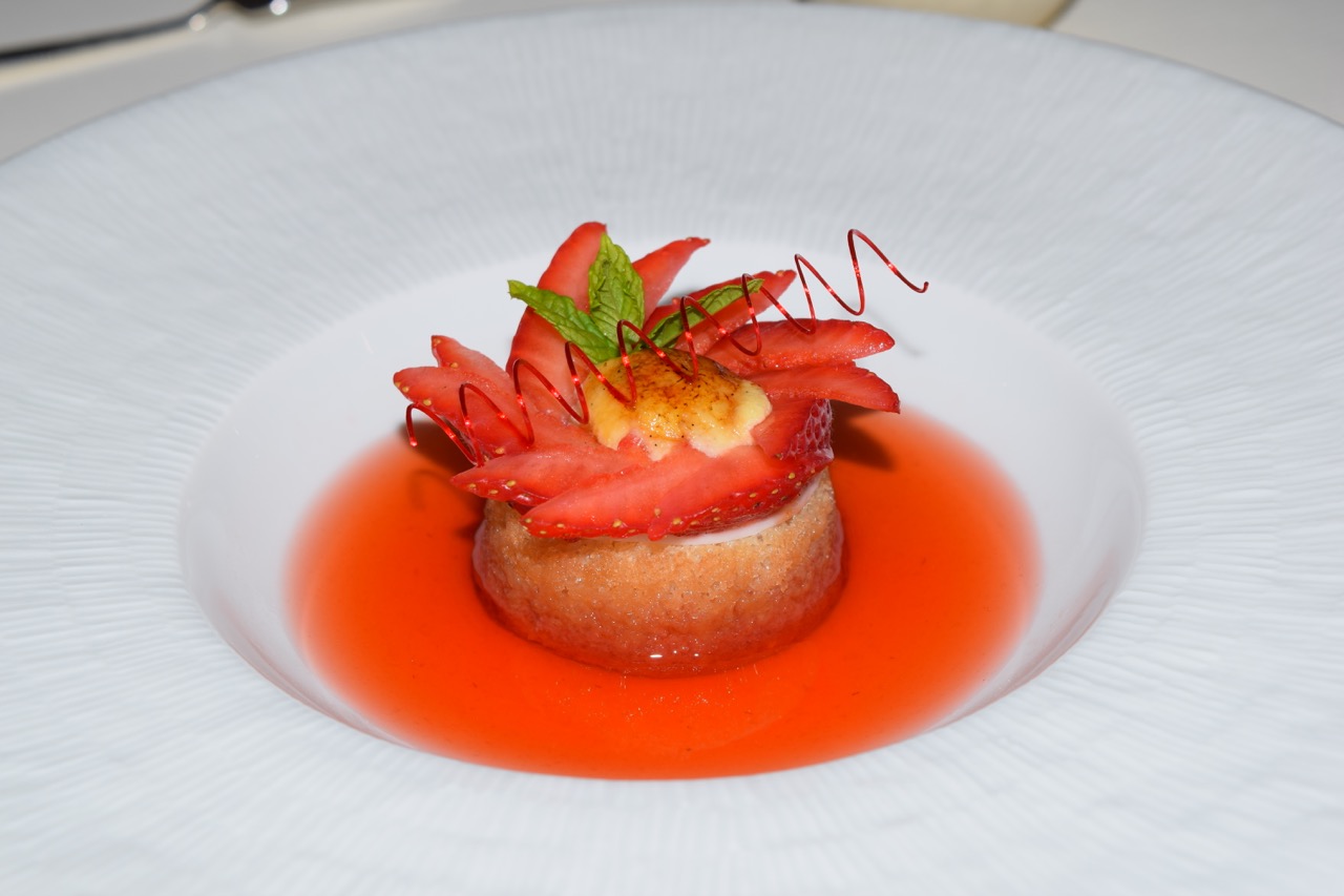 Rum baba: Sponge cake, soaked in rum-flavored syrup with strawberries